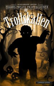 Omslag på Alexander Løkens spenningsbok Trollskallen, med et troll i fokus