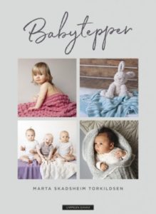 Omslaget til strikkeboka "Babytepper" av Marta Skadsheim Torkildsen