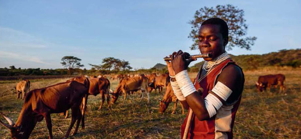 Foto av afrikansk gjeter, fra boka "Afrika" av Tore Linné Eriksen